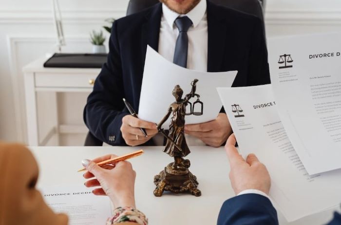 Family law attorney explaining flat-fee divorce pricing to a client