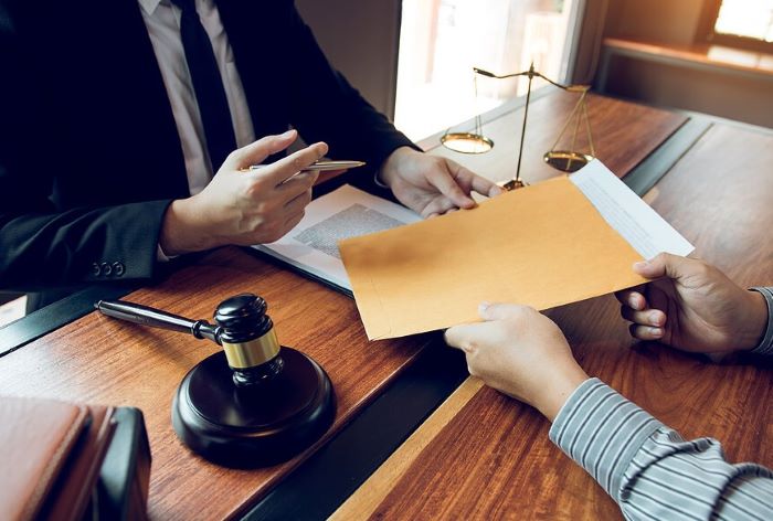 Trial-ready divorce attorney reviewing evidence for a contested North Carolina case